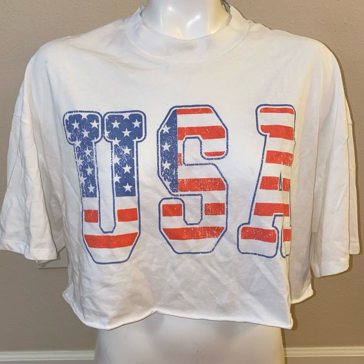 Size Xs Divided Brand Crop Top Light Weight Approximate Measurements: Underarm To Underarm: 25-30 Inches Underarm To Hem: 4 Inches Coller To Hem: 19 Inches See Photos Thank You For Looking White T-shirt With American Flag Print For Spring, Trendy Red Top With Flag Print, Sporty Flag Print Summer Tops, Sporty Summer Tops With Flag Print, Red Flag Print T-shirt, Spring White T-shirt With American Flag Print, American Style White Tops For 4th Of July, Casual White T-shirt With American Flag Print, White Patriotic Tops For Summer