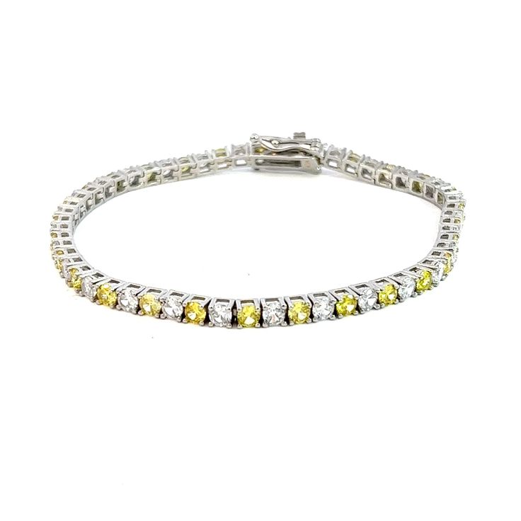 Introducing our radiant Tennis Bracelet, a true embodiment of Italian elegance and sophistication. Crafted with precision in Italy, this bracelet is adorned with a captivating array of yellow and white stones set in .925 silver, exuding a luminous charm that captivates the senses. Each stone is carefully selected for its impeccable quality and brilliance, expertly set within the exquisite links of the bracelet. The harmonious combination of yellow and white stones creates a striking contrast, el Elegant Yellow Diamond Bracelet For Formal Occasions, Formal Yellow Diamond Bracelet, Luxury Yellow Bracelet Jewelry, Luxury Yellow Bracelet, White Bracelets With Sparkling Stones Fine Jewelry, Fine Jewelry White Bracelets With Sparkling Stones, White Bracelets With Sparkling Stones In Fine Jewelry Style, Luxury Yellow Bracelets For Anniversary, White Diamond Bracelet With Sparkling Stones In Sterling Silver