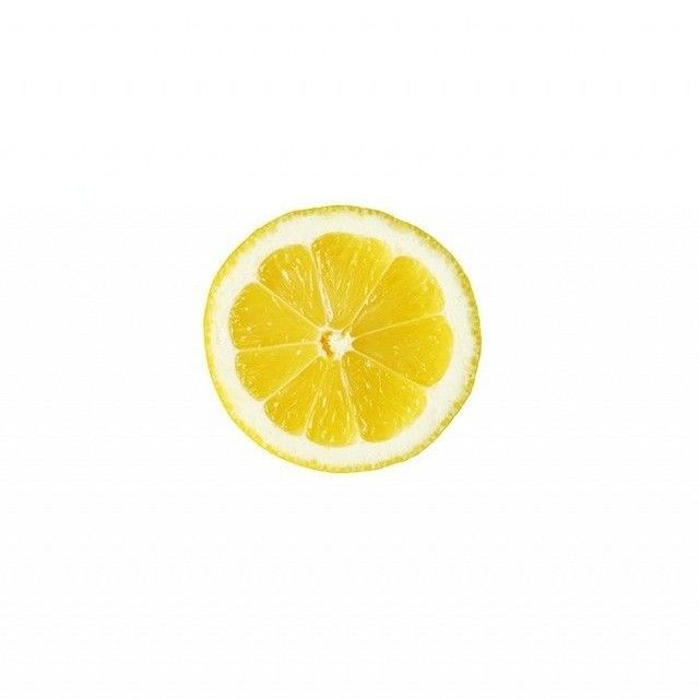 an orange cut in half on a white background