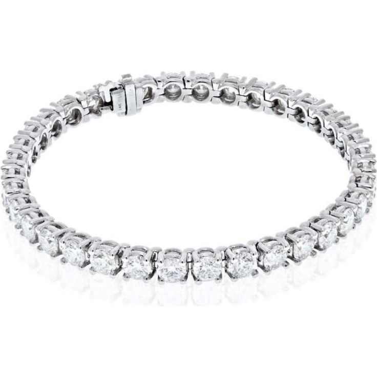 Sparkle and elegance come together in our mesmerizing 11.51 Carat 14K White Gold Round Cut Tennis Bracelet. This exquisite piece is the epitome of timeless beauty, making it a must-have for every jewelry aficionado. With a total carat weight of 11.51, this bracelet is adorned with round cut diamonds that captivate the eye with their remarkable brilliance.Crafted with utmost precision and attention to detail, this tennis bracelet showcases the finest craftsmanship. Each diamond, weighing 0.30 car Luxury Platinum Diamond Bracelet With Brilliant Cut, Elegant Diamond White Gold Jubilee Bracelet, Luxury Platinum Diamond Cut Bracelet, Luxury Round Cut Tennis Bracelet For Formal Occasions, Exquisite Platinum Diamond Bracelet With Brilliant Cut, Diamond White Platinum Bracelet For Formal Occasions, Luxury Tennis Bracelet With Round Cut For Formal Occasions, Exquisite Platinum Tennis Bracelet With Diamond Accents, Luxury Gold Bracelet With Brilliant Cut Diamonds