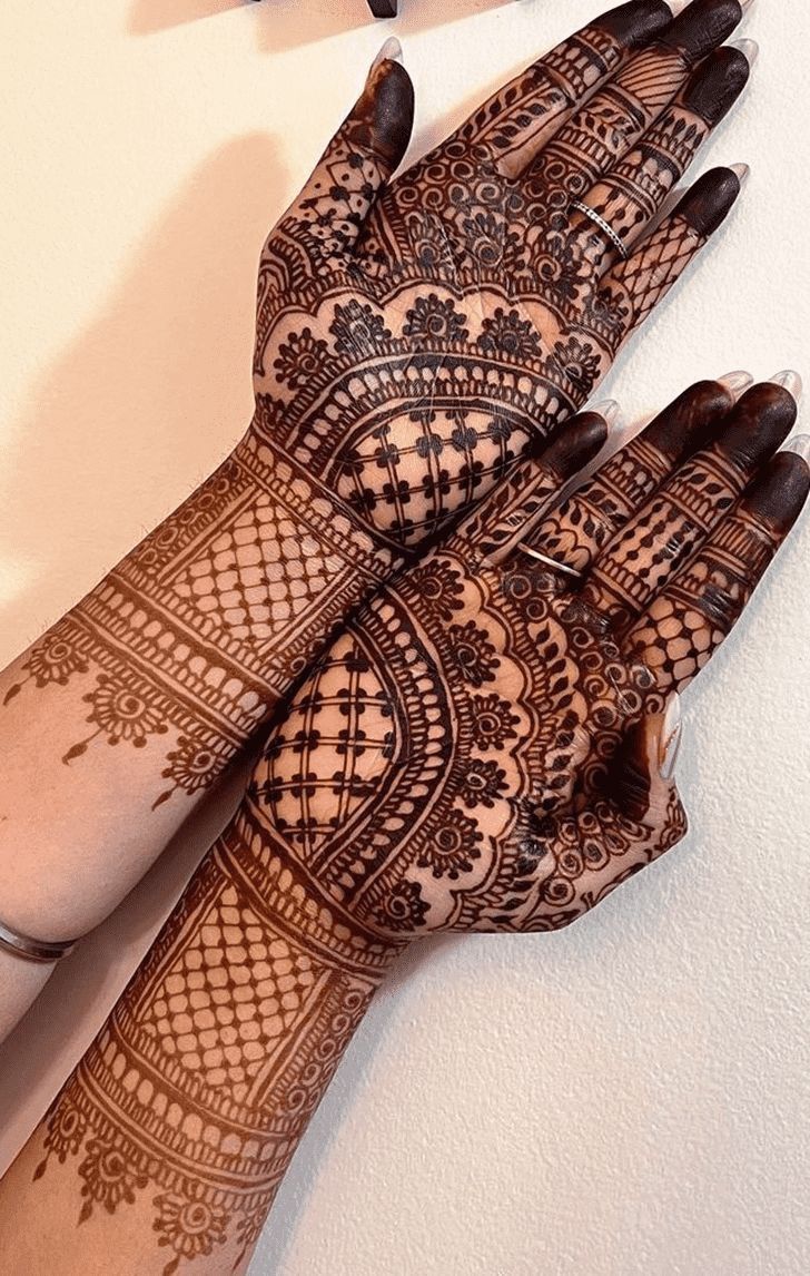 henna tattoo on the hands of a woman