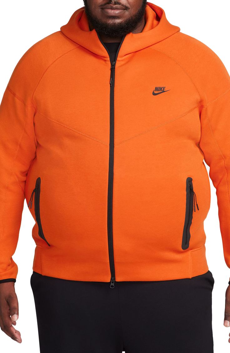 Lightweight Tech Fleece brings softness and warmth without added bulk to a layerable hoodie with zippered pockets for warming hands or holding essentials. 27" length (size medium) Fixed hood 53% cotton, 47% polyester Machine wash, tumble dry Imported Nike Tech Fleece, Nike Tech, Tech Fleece, Campfire, Orange Black, Zip Hoodie, Nordstrom, Bring It On, Size Medium