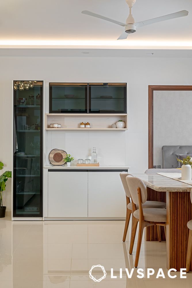 the kitchen is clean and ready to be used as a dining room or living room