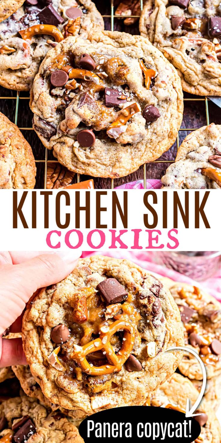 a person holding up a cookie with chocolate chips and pretzels on it, in front of the words kitchen sink cookies