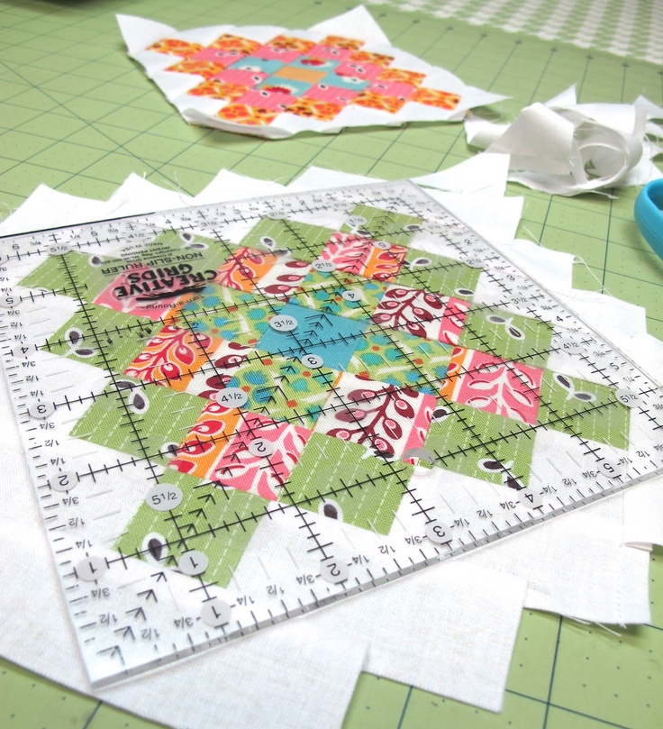 the quilts are laid out on the table to be sewn