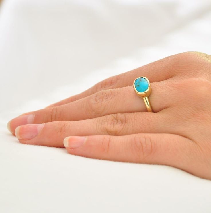 "Unique set of two handmade gold rings. One Turquoise 14k solid gold ring and: Beautiful Turquoise stone set in high gold bezel. The ring is 14k yellow gold, with oval bezel. The Turquoise cabochon gemstone is a beautiful, blue, shining stone that contrasts with the yellow of the gold. One 14k solid gold balls ring: This 14k gold ring is dainty and delicate....accordingly the gold balls are tiny. This set of rings ring can be a romantic gift, or a gift for a daughter, mother, wife or anyone you Gold Turquoise Ring Birthstone For Gift, Gold Turquoise Birthstone Ring Gift, Gold Turquoise Ring With Gemstone For Anniversary, Gold Turquoise Ring With Birthstone For Anniversary, Handmade Gold Turquoise Ring For Anniversary, Elegant Gold Turquoise Ring With Bezel Setting, Gold Hallmarked Turquoise Ring Fine Jewelry, Gold Turquoise Ring Hallmarked Fine Jewelry, Yellow Gold Emerald Cabochon Ring Gift