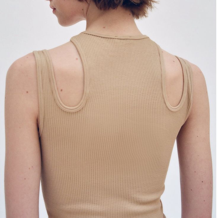 Ribbed Cut Out Top With Round Neck. Color: Beige-Pink Size: M-L Spring Beige Tops With Seamless Construction, Spring Beige Top With Seamless Construction, Zara Seamless Stretch Top, Trendy Seamless Tops By Zara, Zara Stretch Seamless Tops, Zara Ribbed Beige Tops, Zara Stretch Solid Color Tank Top, Zara Beige Ribbed Top, Stretch Zara Tank Top