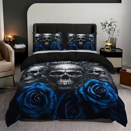 a bed with blue roses and skulls on it