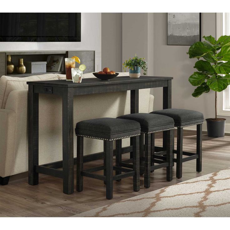 River Sofa Bar with Stools from Elements Furniture. Constructed of select hardwood solids. Features an AC power outlet with USB plugs. Includes three stools, 15"Wx15"Dx23"H, not sold separately. Some assembly required if not delivered by AFW. Width: 60" | Height: 36" | Depth: 20 | Color/Finish: Gray Console Table With Stools Underneath, Sofa Table Behind Couch With Stools, Sofa Table With Seating, Sofa Bar Table Behind Couch, Sofa Table With Stools, Bar Table With Stools, Console Table With Stools, Console Table Behind Sofa, Modern Office Design Inspiration