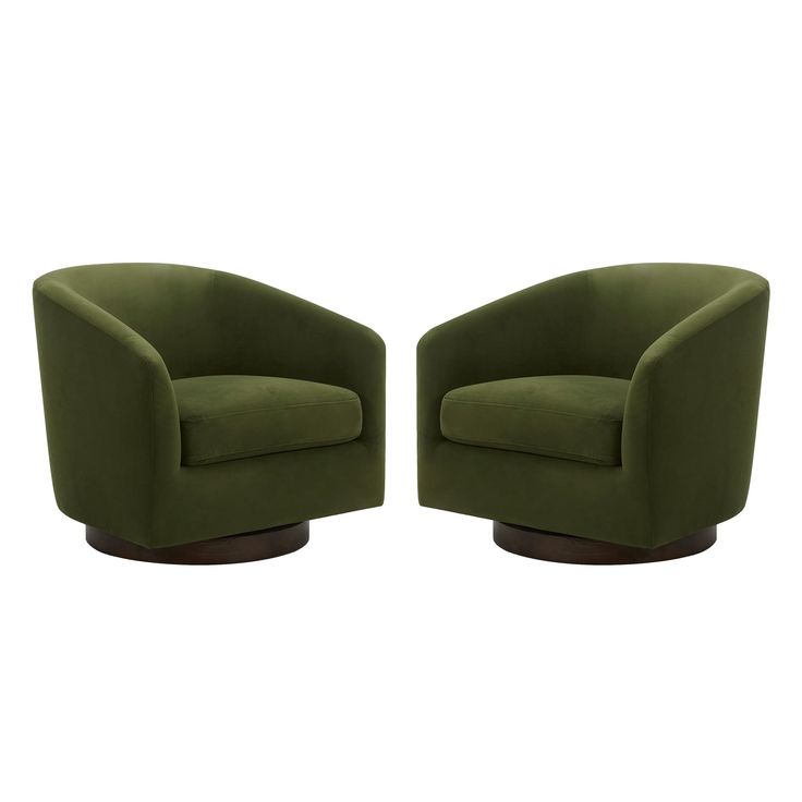 two green chairs sitting next to each other