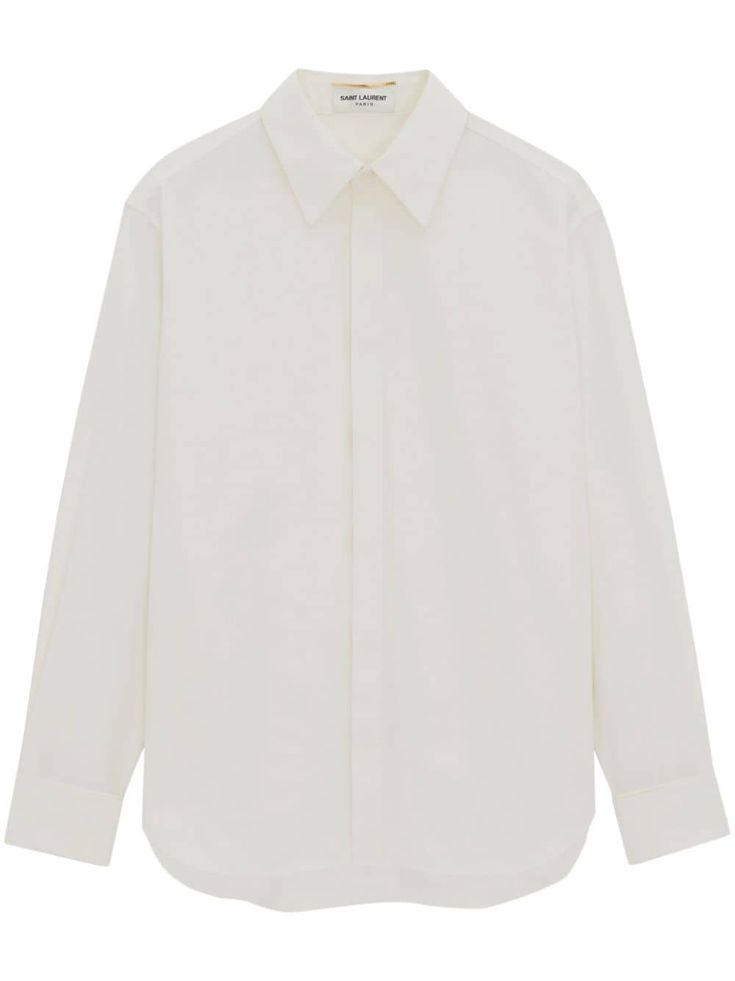 white cotton poplin texture pointed flat collar long sleeves French cuffs curved hem concealed front button fastening We've partnered with Good On You — an independent agency that rates how brands perform in relation to their impact on the planet, people and animals, with a multi-criteria rating simplified to a five points scale. In order to be awarded our conscious label, larger brands need to score a minimum of four out of five ('Good'), while smaller brands must score at least three out of fi White Long Sleeve Top With Concealed Placket, Modern Long Sleeve Dress Shirt With Concealed Placket, Modern Long Sleeve Shirt For Office, Timeless Long Sleeve Dress Shirt For Daywear, Modern White Blouse With Concealed Placket, White Long Sleeve Blouse With Hidden Button Closure, Modern Long Sleeve Shirt With Placket, White Long Sleeve Dress Shirt With Concealed Placket, Oversized Formal Shirt With Concealed Placket