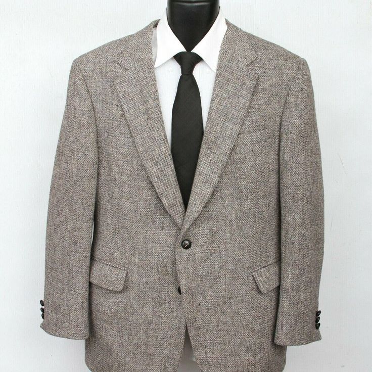 Vintage Harris Tweed Gray Brown Herringbone 2 Butt 1 Vent Sport Coat Men's Size 42 S Harris Tweed Gaede's Gray/Brown Scottish Wool Herringbone Pattern Half Lined Two Button Three Button Cuffs Single Vent Sport Coat Suit Jacket Formal Dress Business Casual Men's Size 42 S See Last Pic For Measurements. Wear No Damage Or Flaws Noted On The Outside. There Is A 1-2" Section Of Underarm Stitching That Has Come Loose. There Is A Small Spot On The Inner Lining Around The Top Middle Of The Back. Semi-formal Herringbone Tweed Jacket, Business Tweed Jacket With Herringbone Pattern, Business Tweed Jacket, Classic Formal Tweed Jacket With Herringbone Pattern, Formal Sport Coat With Herringbone Pattern And Suit Collar, Tailored Gray Wool Tweed Jacket, Gray Wool Tweed Jacket With Notch Lapel, Gray Notch Lapel Tweed Jacket For Business, Gray Tweed Jacket With Notch Lapel For Business