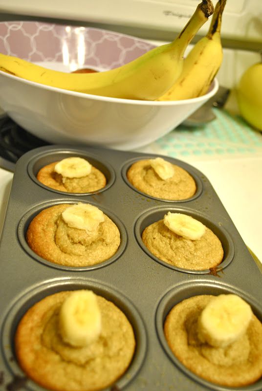 the banana muffins have been made in a muffin tin and are ready to be eaten