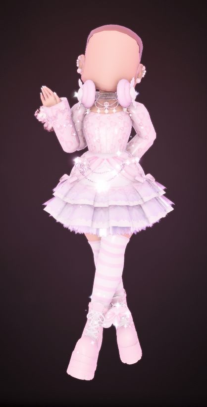 the doll is dressed in pink and white