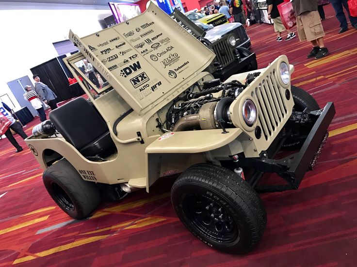 the jeep is on display at an auto show