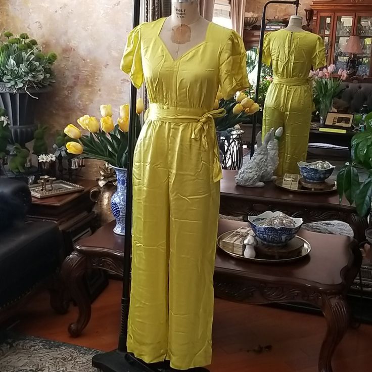 New, Never Worn. Pockets At Sides, Zipper At Back. Color Most Resembles Last Photo Sash Belt Included And Shown, One Belt Loop Is Ripped From The Seam But Not Necessary To Hold The Belt In Place. No Care/Content Labels Elegant Yellow Fitted Jumpsuits And Rompers, Elegant Fitted Yellow Jumpsuits And Rompers, Elegant Fitted Yellow Jumpsuit, Elegant Yellow Jumpsuits And Rompers For Work, Elegant Yellow Jumpsuits For Workwear, Yellow Fitted Jumpsuit With Short Sleeves, Fitted Yellow Jumpsuits And Rompers With Short Sleeve, Fitted Yellow Jumpsuit With Short Sleeves, Spring Yellow Jumpsuits And Rompers For Workwear