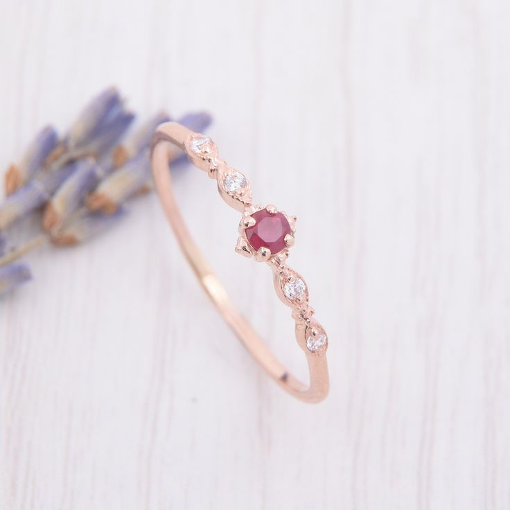 Small & dainty 14k rose gold antique victorian pink ruby engagement ring, Delicate minimalist art deco style ruby promise ring for her WE OFFER UNLIMITED PERIOD INSTALLMENTS PLAN This is a beautiful, stunning, feminine ring that works well for all occasions, styles, and ages. You will love it! Ring information: Main stone: Ruby Approximate size: 2.5mm Accent stones: Cubic zirconia Approximate size: 1.25mm (4 stones) Approximate weight: 0.092ct ( in total) Approximate width of Band: 1.0mm Fro Elegant Bezel-set Ruby Wedding Ring, Elegant Ruby Ring With Bezel Setting For Wedding, Delicate 14k Rose Gold Jewelry With Rose Cut Diamonds, Elegant Ruby Ring With Rose Cut Diamonds For Promise, Elegant Lab-created Ruby Promise Ring Jewelry, Elegant Pink Ruby Ring With Round Band, Elegant Pink Ruby Promise Ring, Elegant Rose Gold Ruby Ring With Rose Cut Diamonds, Elegant Red Stackable Promise Rings