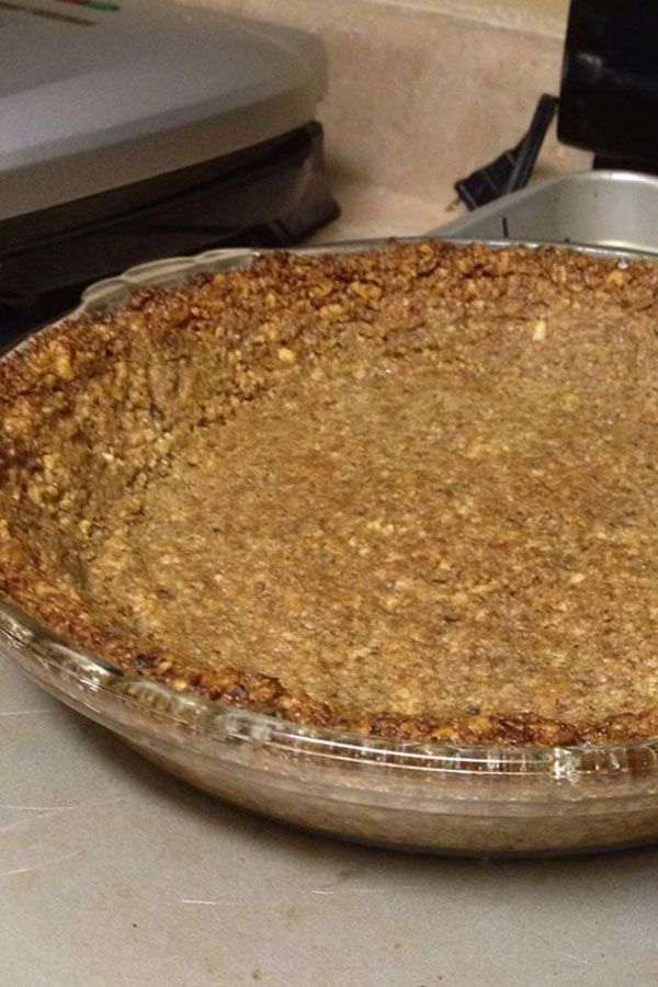 an uncooked pie sitting on top of a counter