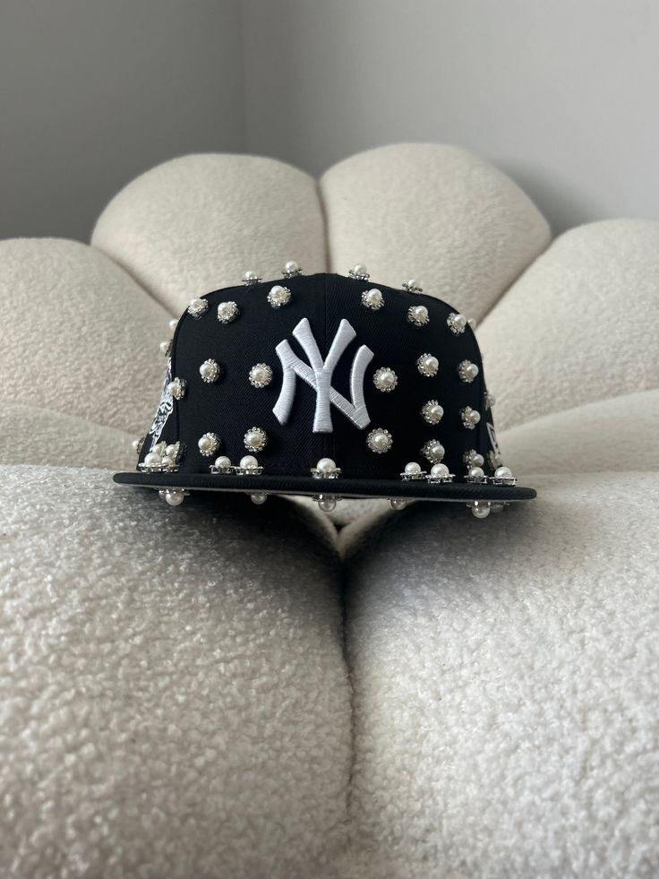 Each rhinestone is hand placed by me. Bling Hats Rhinestones, Bling Aesthetic Outfit, Bedazzled Fitted Hat, Diy Rhinestone Hat, Pearl Fitted Hat, Fitted Hat Outfit Black Women, Street Wear Hats, Bedazzled Hat, Pearl Hat