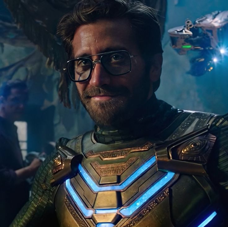 a man with glasses and a beard in a sci - fi suit standing next to other people