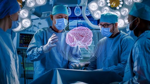 doctors performing surgery in an operating room with brain images projected on the screen above them