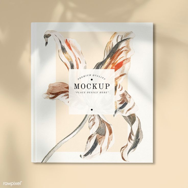 a book cover with an image of feathers on it and the words mockup written in white