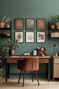 a home office with green walls and lots of plants