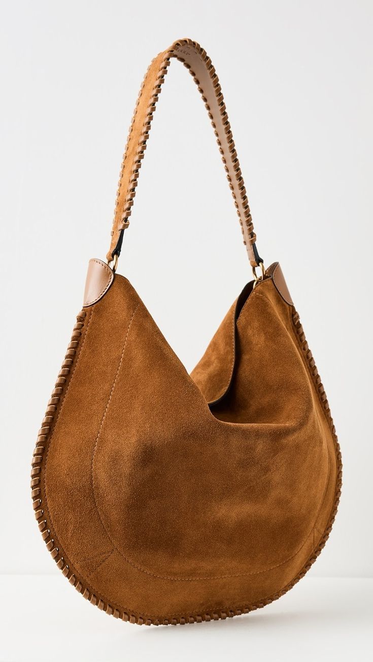 Isabel Marant Oskan Hobo Soft Bag | Shopbop Luxury Suede Hobo Bag With Leather Handles, Chic Leather Hobo Bag With Suede Lining, Luxury Suede Bags With Gold-tone Hardware, Elegant Brown Hobo Bag With Suede Lining, Luxury Suede Hobo Bag With Soft Leather, Luxury Everyday Hobo Bag With Suede Lining, Luxury Hobo Shoulder Bag With Suede Lining, Luxury Suede Hobo Bag, Luxury Hobo Bag With Suede Lining