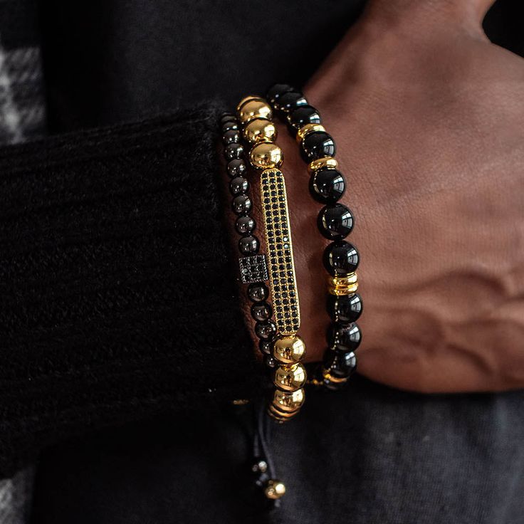 Chase your luck with the Vegas bracelet stack! The Vegas stack features trifecta of beaded beauties - black onyx, golden glitz, and rhodium PVD for a triple threat of style. Plus, a lucky dice and CZ bar for a dash of extra luck. Indulging the adventurous spirit and wandering heart that lives within all of us, our men's bracelet stacks have been crafted to provide a touch of class to your wardrobe throughout the year. Each exquistely curated stack includes a mix of spiritually healing gemstones Spiritually Healing, Dice Bracelet, Mens Bracelet Fashion, Mens Accessories Bracelet, Bracelets Stack, Meaningful Symbols, Bracelets Black, Bracelet Stacks, Men Bracelets