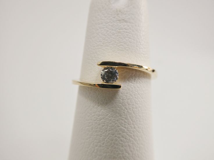 Real 14k solid yellow gold 2.5mm stone center micro fave setting tiny super high quality pinky ring size 4 / 1.5mm aaa shiny cubic zirconia stone made in 14k solid gold our 14k solid gold pieces are made in high quality to last for ever you can wear it evrey day extra high polish luxury attractive look guarantte real 14k solid gold mark and stamp perfect price come in nice gift box make great gift for any occasion Dainty Adjustable Diamond Ring For Formal Occasions, Minimalist Diamond Crystal Ring With Vvs Clarity, Yellow Gold Diamond Ring With Single Cut Round Stone, 14k Gold Diamond White Stackable Rings For Anniversary, 14k Gold Brilliant Cut Crystal Ring, Minimalist 14k Gold Sapphire Ring With Prong Setting, 14k Gold Stackable Promise Rings With Diamond Accents, 14k Gold Stackable Rings With Diamond Accents, Adjustable 14k Gold Diamond Ring With Open Shape