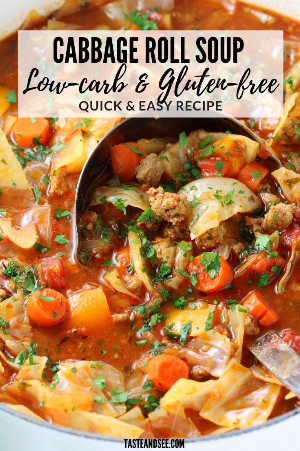 cabbage roll soup in a white bowl with a spoon