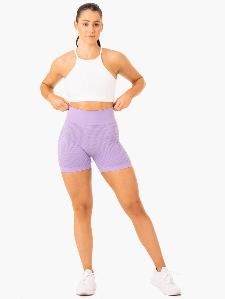 Model is 167cm tall. She usually wears a size S and is wearing a size S. Her waist measures 68cm and her hips measure 91cm. High foldover waistband in compression fabric Contoured back waistband No front seam Scrunch bum Mid-length short Made from lightweight honeycomb seamless fabric designed to enhance your curves Waistband : 80% Polyamide/20% Spandex Main: 92% Nylon/8% Elastane Recommended for training. Purple Gym Bottoms Short Length, Purple Stretch Short Length Activewear, High Waist Stretch Lavender Bottoms, Lavender Fitted Short Bottoms, Purple Yoga Shorts With Short Legs, Purple Biker Shorts For Gym, Fitted Purple Mid-thigh Length Shorts, Fitted Purple Shorts Mid-thigh Length, Fitted Purple Shorts, Mid-thigh Length