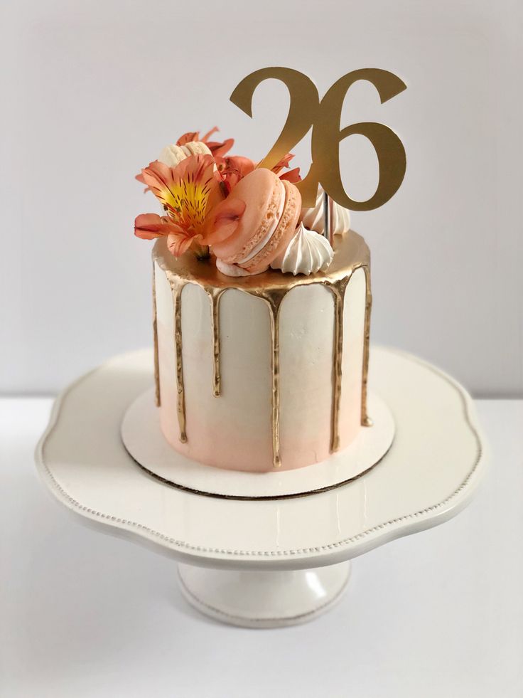 Peach to white gradient cake. Gold drip. Macarons, flowers, and meringues on top in a crescent arrangement. Gold topper reads “26”. Peach Colour Birthday Cake, 26 Th Birthday Cake, Birthday Cake 26th Birthday Girl, Cake 26 Birthday Woman, 26th Birthday Cake For Women, 26th Birthday Ideas For Women Theme, Birthday Cake 26th Birthday, 26th Birthday Cakes, Peach Theme Cake