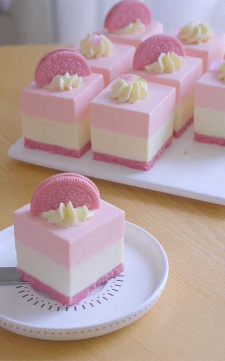 several pieces of cake sitting on top of a white plate