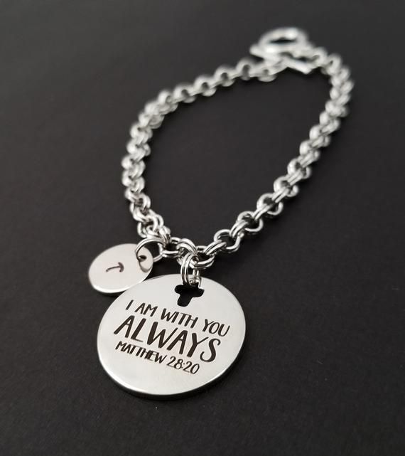 Matthew 28:20 I am with you always braceletPersonalized Stainless Steel Bible Verse Bracelet! A round charm printed with "I am with you always Matthew 28:20" on a bright silver chain makes the perfect gift for you or a loved one.The bible verse bracelet charm is made from stainless steel and measures 24 mm by 24 mm.  The bracelet is high quality zinc alloy and measures 8.5".  The religious bracelet can be personalized with a .5" silver plated disc stamped with the initial of your choice.  The ch Friendship Stainless Steel Charm Bracelet, Stainless Steel Charm Bracelet For Friendship, Stainless Steel Round Charm Bracelet For Friendship, Inspirational Silver Bracelet For Birthday Gift, Meaningful Silver Bracelet For Birthday Gift, Inspirational Silver Stainless Steel Bracelets, Verse Bracelet, Bible Verse Bracelet, Bible Verse Jewelry