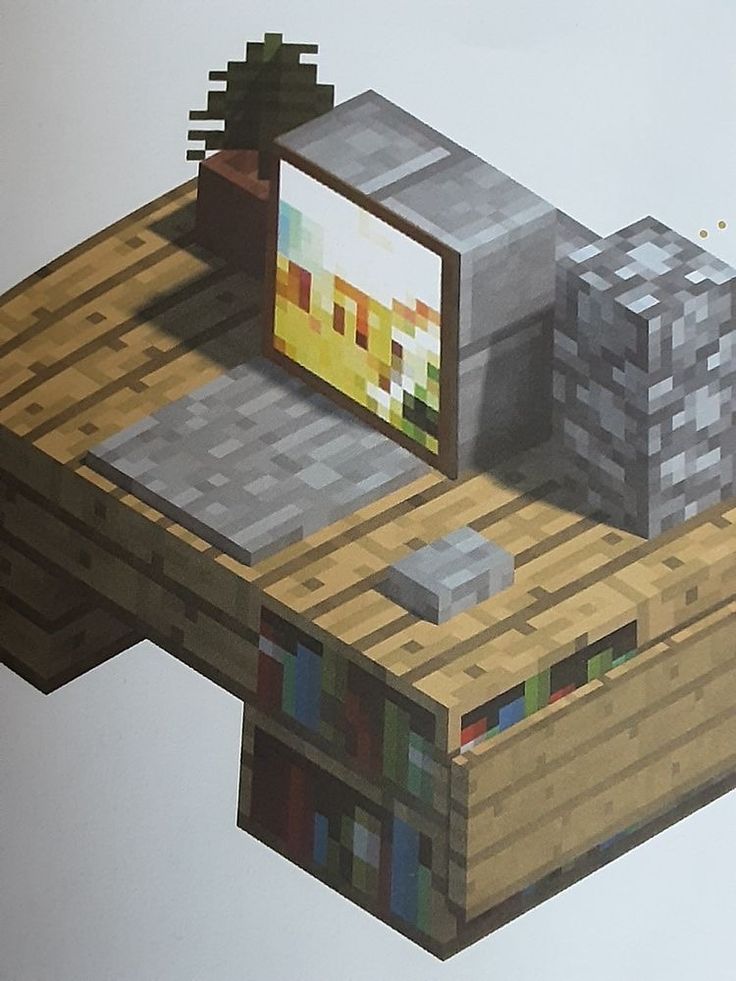 an image of a desk made out of wood and blocks with a computer on it