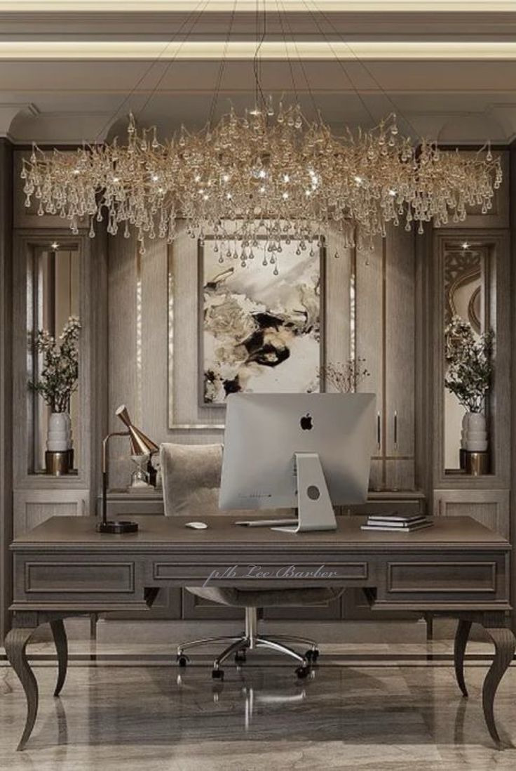 an elegant home office with chandelier hanging from the ceiling