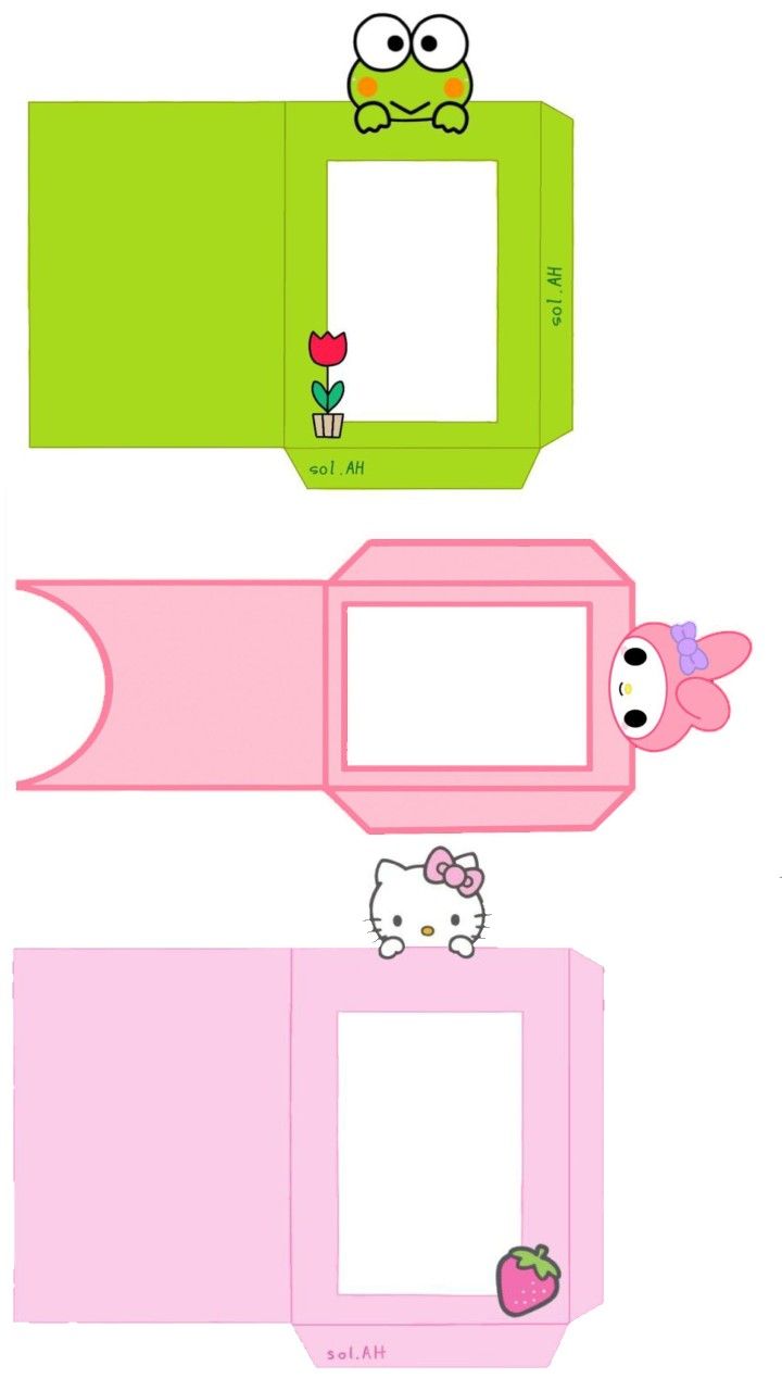 paper cut outs with hello kitty on the top and bottom, one has an empty space for