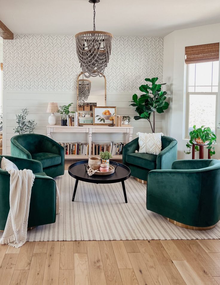 a living room filled with furniture and a chandelier