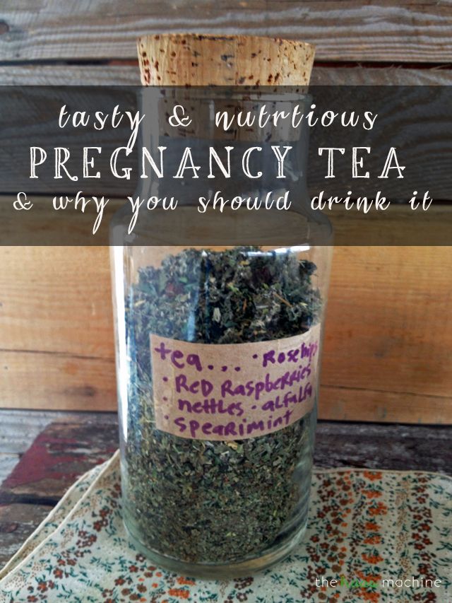 a jar filled with tea sitting on top of a table