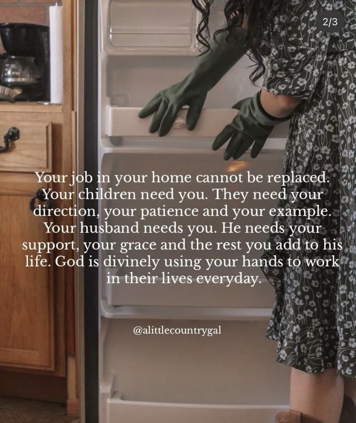 a woman is reaching into an open refrigerator