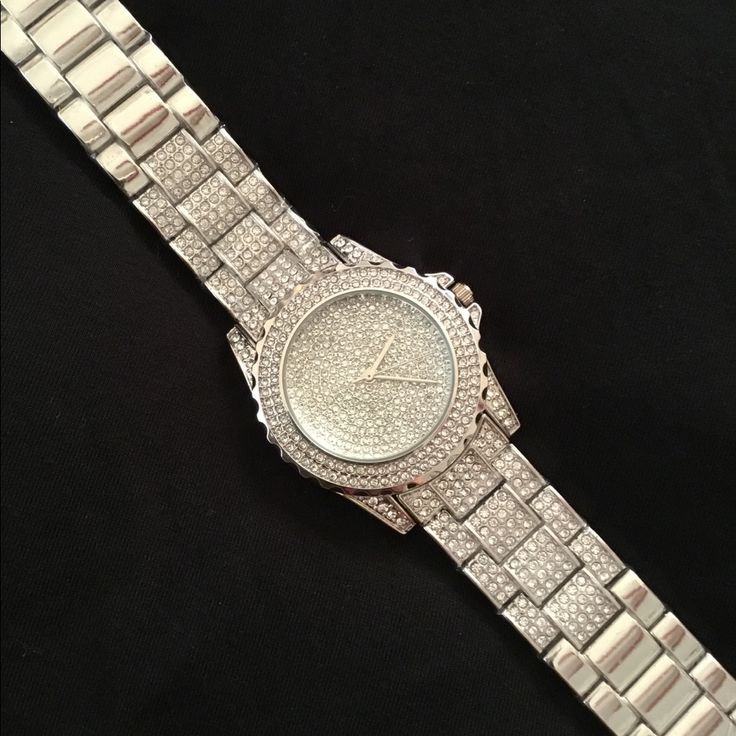 Stunning! Bold Rhinestone Encrusted Silver Watch! What A Statement Piece! Fits Up To A 8” Wrist, Has Removable Links For Size Adjustment. It’s Been Tucked Away In My Jewelry Armoire And Never Been Used... Just Needs A Battery. If You Are A Bling Queen, You Need This! Smoke Free. Gift Watches With Crystal And Rhinestones, Silver Diamond Watch With Cubic Zirconia For Parties, Silver Cubic Zirconia Diamond Watch For Party, Bling Metal Diamond Watch As Gift, Gift Diamond Bling Watch, Gift Metal Diamond Watch With Bling, Silver Diamond Watch With Rhinestones And Crystal, Diamond Watch With Rhinestones For Party, Silver Diamond Bling Watch For Parties