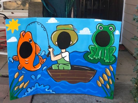 a child's hand painted sign with an image of a frog and a fisherman