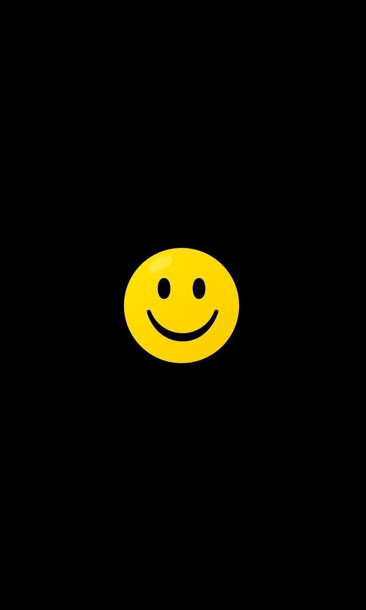 a yellow smiley face on a black background