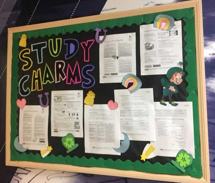 a bulletin board that has some papers on it with the words study charms attached to it