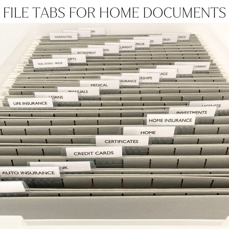 file tabs for home documents stacked on top of each other