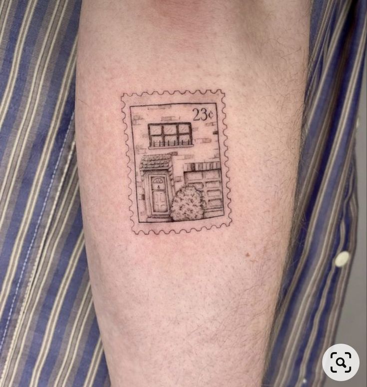 a stamp on the leg with a drawing of a store front and window in it