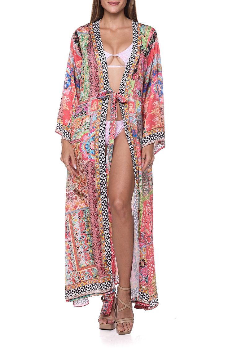 Go from beach to boardwalk in this sun-ready cover-up duster that's secured with a front tie and rendered in a bright print. Shawl collar Long sleeves Integrated waist tie
 100% polyester Hand wash, dry flat Imported Summer Patterned Kimono For Beach Cover-up, Bohemian Multicolor Printed Cover-up, Printed Kimono Beach Cover-up For Beach Season, Multicolor Summer Kimono For Beach Cover-up, Pink Kimono For Beach Cover-up During Beach Season, Pink Kimono For Beach Cover-up, Spring Multicolor Swimwear For Beach Cover-up, Colorful Beach Dress For Spring, Colorful Beach Cover-up Dress For Spring