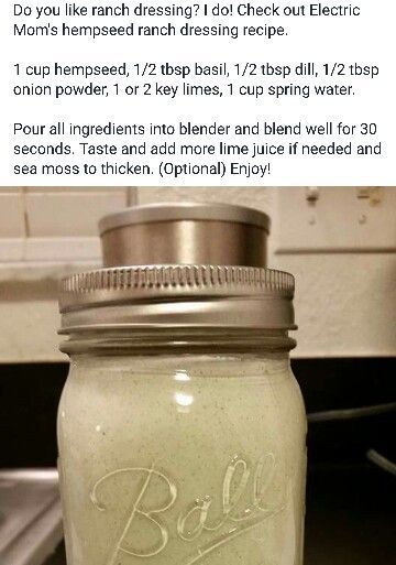 a mason jar filled with liquid sitting on top of a counter