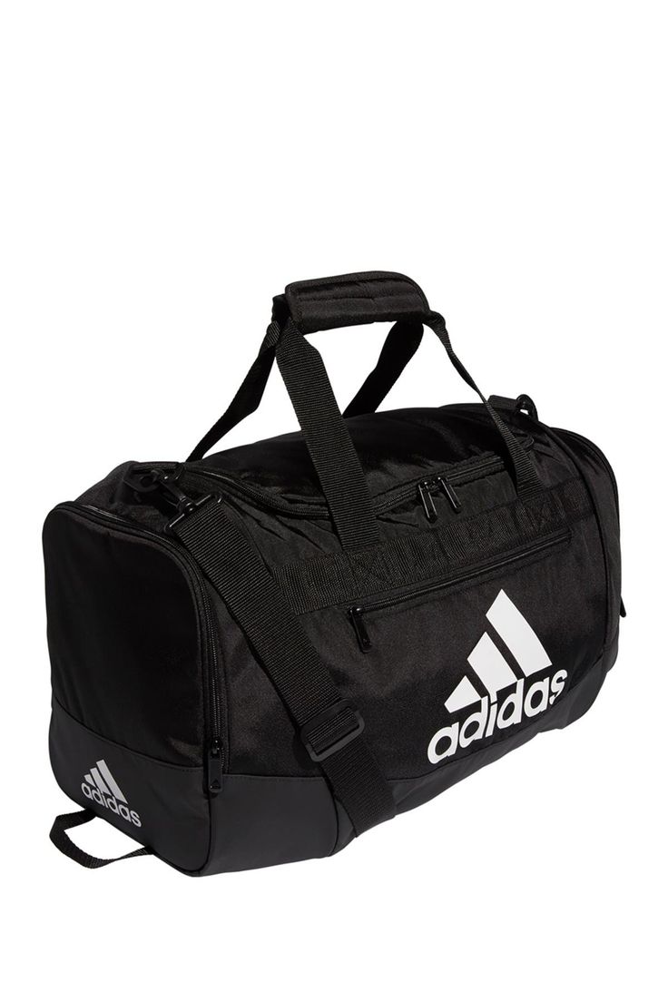 This roomy duffel features a sporty silhouette that includes zip pockets to keep your essentials organized. Dual top handles. Single detachable, adjustable strap. Zip top closure. Exterior features 3 zip pockets and logo print details. Interior features 1 zip pocket. Imported Adidas Nylon Sports Bag, Functional Adidas Gym Bag For Sports, Sporty Adidas Bags For Outdoor, Adidas Sporty Outdoor Bags, Sporty Duffle Bag For Outdoor Activities, Sporty Adidas Outdoor Bags, Sporty Duffle Bag With Zipper For Outdoor Activities, Sporty Duffle Bag With Zipper Pocket For Sports, Sporty Duffle Bag With Zipper Pocket For Outdoor